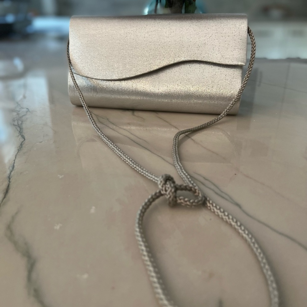 Fancy silver box purse with magnetic button closure one pocket inside